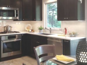 Dark cabinets, white quartz tops and stainless appliances a great combo in our client’s kitchen! #designnj #njdesigninspiration #modernkitchen #njkitchenremodel
