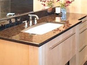 Maple @plainfancycabinets cabinetry, polished brown granite, @grohe_us faucet and stainless hardware complete this modern master bath remodel! #designnj #njbathrooms #moderncabinets #granitecountertops #stainlessfaucet