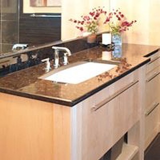 Maple @plainfancycabinets cabinetry, polished brown granite, @grohe_us faucet and stainless hardware complete this modern master bath remodel! #designnj #njbathrooms #moderncabinets #granitecountertops #stainlessfaucet