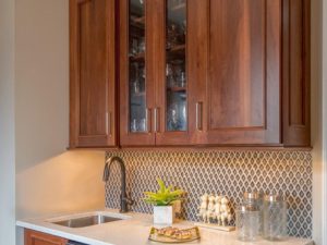 Great diamond shaped backsplash in our client’s new butler’s pantry!  #designnj #njkitchenremodel #njkitchens #butlerspantry #quartzcountertop #beveragerefrigerator  #undercabinetlighting