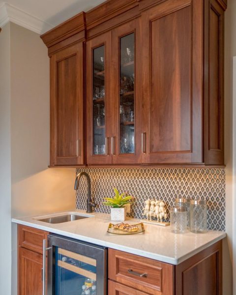 Great diamond shaped backsplash in our client's new butler's pantry!  #designnj #njkitchenremodel #njkitchens #butlerspantry #quartzcountertop #beveragerefrigerator  #undercabinetlighting