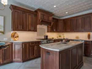 Swipe 👉🏻to see our client’s amazing kitchen transformation! Updated, modernized and ready to take on the next decades of cooking and family get togethers! #designnj #njkitchendesign #kitchenbeforeandafter #walnutcabinets #leatheredgranite