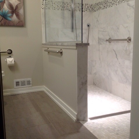 Curbless shower solution for our client's new bathroom. #newjerseykitchenandbath #designnj #aginginplace #njbathrooms #bathremodel #curblessshower #kitchenandbathdesigncenter #modernbathrooms