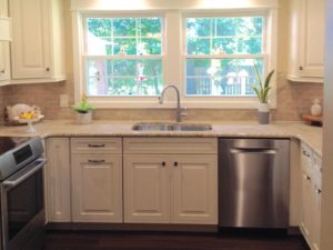 Our client’s new small & mighty kitchen with a beautiful view of the backyard! #njkitchens #kitchendesignideas #smallkitchen #designnj #whitekitchen #kitchenwindow