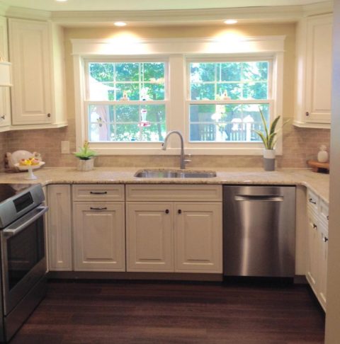 Our client's new small & mighty kitchen with a beautiful view of the backyard! #njkitchens #kitchendesignideas #smallkitchen #designnj #whitekitchen #kitchenwindow