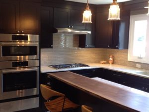 A view of our client’s newly renovated kitchen! #maplecabinets #liveedgeisland #stainlessappliances #boschappliances #kitchentile #shakercabinets #kitchendesignnj #newjerseykitchens #designnj