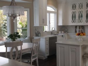 Another great view of our client’s new kitchen! #whitekitchencabinets #glasscabinetdoors #kitchenbaywindow #baywindow #njkitchen #designnj #njdesign #njkitchenshowroom #newjerseykitchendesign #archedwindows #downtownhightstown