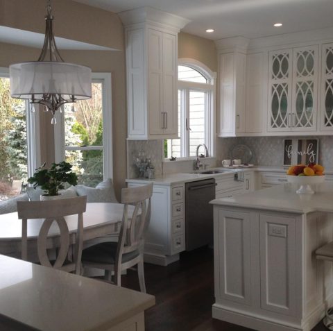 Another great view of our client's new kitchen! #whitekitchencabinets #glasscabinetdoors #kitchenbaywindow #baywindow #njkitchen #designnj #njdesign #njkitchenshowroom #newjerseykitchendesign #archedwindows #downtownhightstown