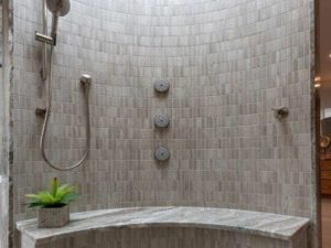 Interior view of our client’s curved wall curbless shower! #njbathrooms #designnj #njdesigner #kitchenandbathshowroom #showertime #newjerseydesign