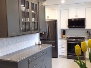 We are so excited to share our client’s newly renovated kitchen! We love the two toned vibe – the gray painted buffet is a standout with the white shaker cabinetry! #samsung #blackstainlesssteel #stainlesshardware #bevelledsubwaytile #porcelainfloortiles #granitecountertops #njkitchen #njkitchendesign #newjerseykitchenandbathshowroom #twotonedkitchen