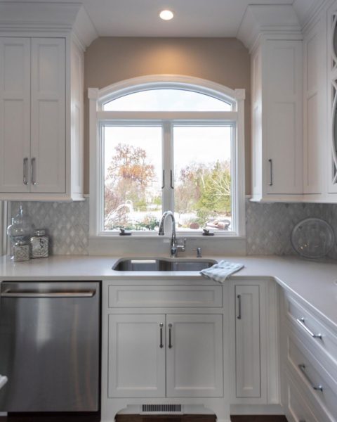 Window views in our client’s new kitchen! #newjerseydesign #newjerseyremodelingcontractors #designnj #kitchenandbathshowroom #whitequartz #whitecabinets #archedwindows #newjerseykitchenandbath