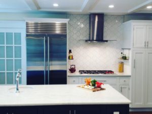 Throw back Thursday to our client’s renovated kitchen! #whitecabinets #whitequartz #stainlesshood #twotonekitchen #frenchdoors #designnj #newjerseykitchenandbath #njdesigner #njkitchenandbathshowroom