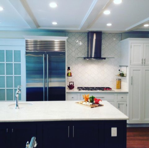 Throw back Thursday to our client’s renovated kitchen! #whitecabinets #whitequartz #stainlesshood #twotonekitchen #frenchdoors #designnj #newjerseykitchenandbath #njdesigner #njkitchenandbathshowroom