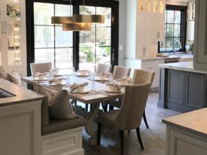 A view of the kitchen dining area in our client’s newly renovated kitchen. A great collaboration with Kathleen  @graciouselementsofdesign #banquetteseating #diningroominspo #diningroomdecor #kitchenlighting #twotonekitchen #customseating #njdesign #njkitchens #designnj #interiordesign #interiordecorating #designcollaboration #newjerseykitchenremodel #njkitchenandbathshowroom