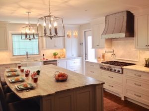 Cozy kitchen views. #kitchenislandlighting #potfiller #kitchenhood #njdesign #designnj #kitchenremodel #njkitchenandbathshowroom #kitchendesign #cozykitchen