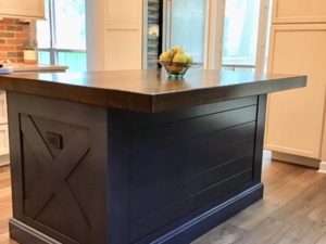 X marks the spot on our client’s new kitchen island!#bluecabinets #xmarksthespot #woodcounters #kitchendesign #designnj #newjerseykitchens #newjerseykitchenshowroom #newjerseykitchenandbathshowroom #kitchen