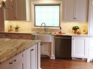 Custom inset cabinets, farm sink, honed granite and warm wood floors in our client’s renovated kitchen!#njkitchens #designnj #insetcabinets #woodfloors #farmsink #honedgranite #kitchenbaywindow #kitchenisland #newjerseylife #kitchenandbathdesign