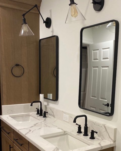 We love the vanity lights in our client’s newly renovated bathroom! #bathroomremodel #njbathrooms #newjerseylife #newjerseybathroomrenovation #vanitymirror #designideas #vanitylights #designnj