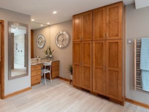 Custom linen storage closet and makeup area in our client’s renovated master bathroom. #designinspiration #masterbathroom #njdesign #customcabinets #makeupvanity #masterbathroomremodel #newjerseykitchenandbath