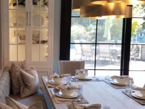 We built this custom glass curio cabinet to pair with the banquette seating in our client’s beautifully renovated kitchen! #banquetteseating #customglasscabinet #customcabinets #kitchenrenovation #njdesign #newjerseylife #kitchenseating #newjerseykitchenremodel #njkitchenrenovation